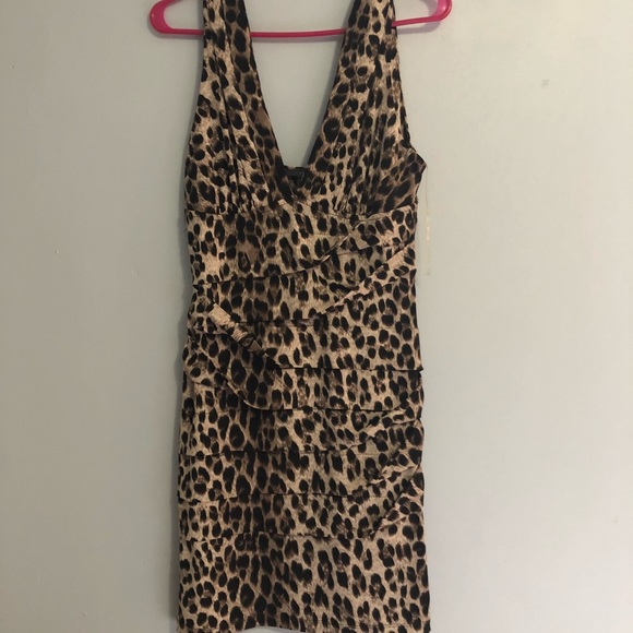 Dresses & Skirts - Mini Leopard low cut ridge dress